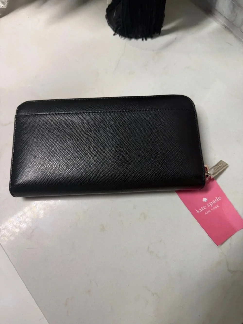 kate spade Black Leather Zip-Around Wallet with Gold Logo